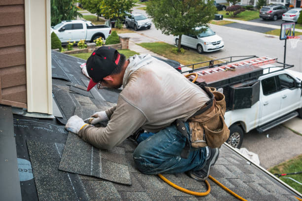 Professional Roofing technician working in Hyde Park, NY